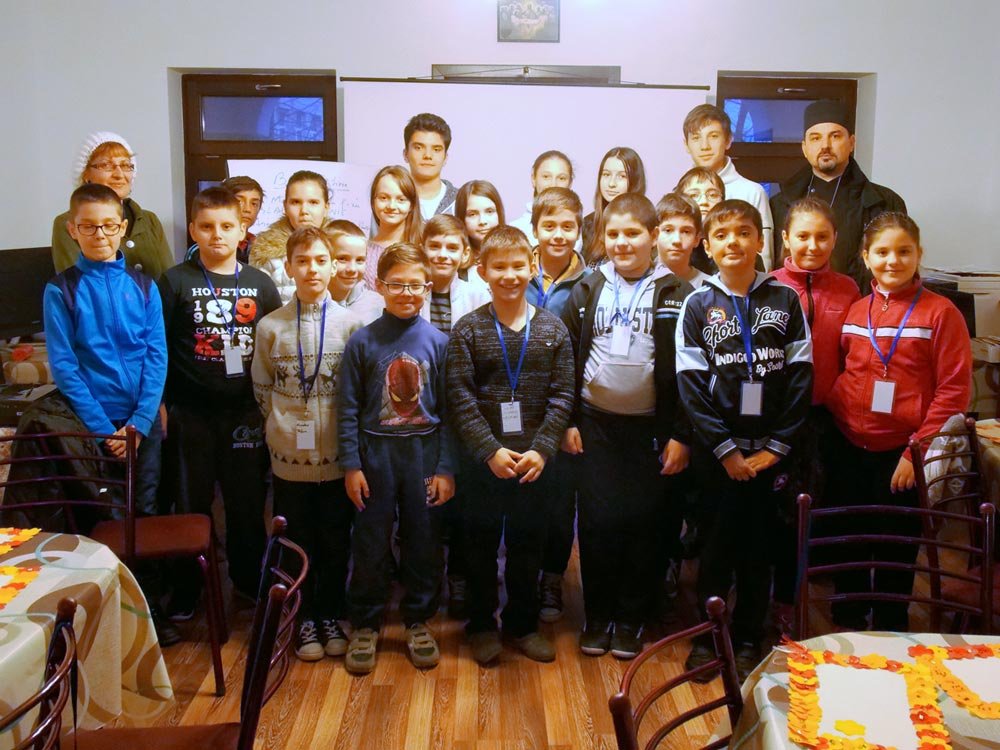 Sprijin pentru elevii silitori din parohie 72116