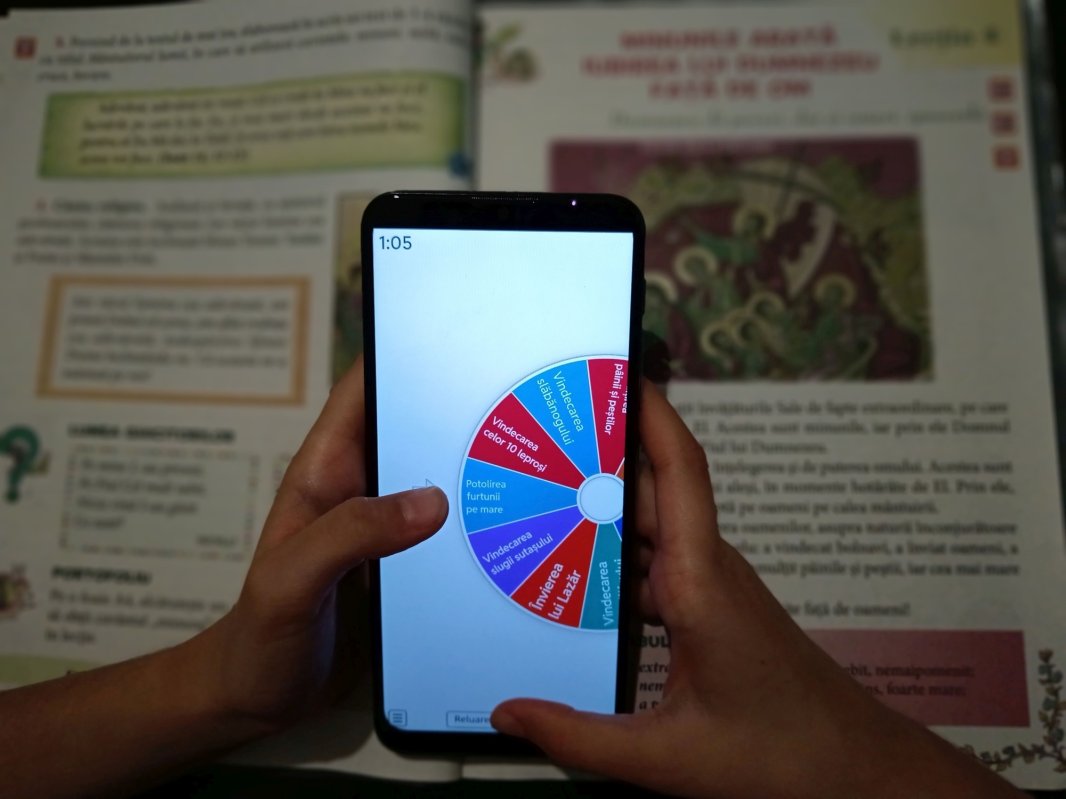 Noile tehnologii şi predarea religiei 348897