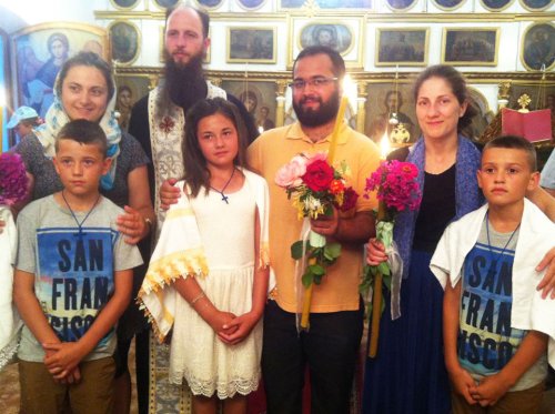 Ioan, Elena şi David - cei trei copii care au primit Taina Botezului în „Tabăra din pridvorul satului“